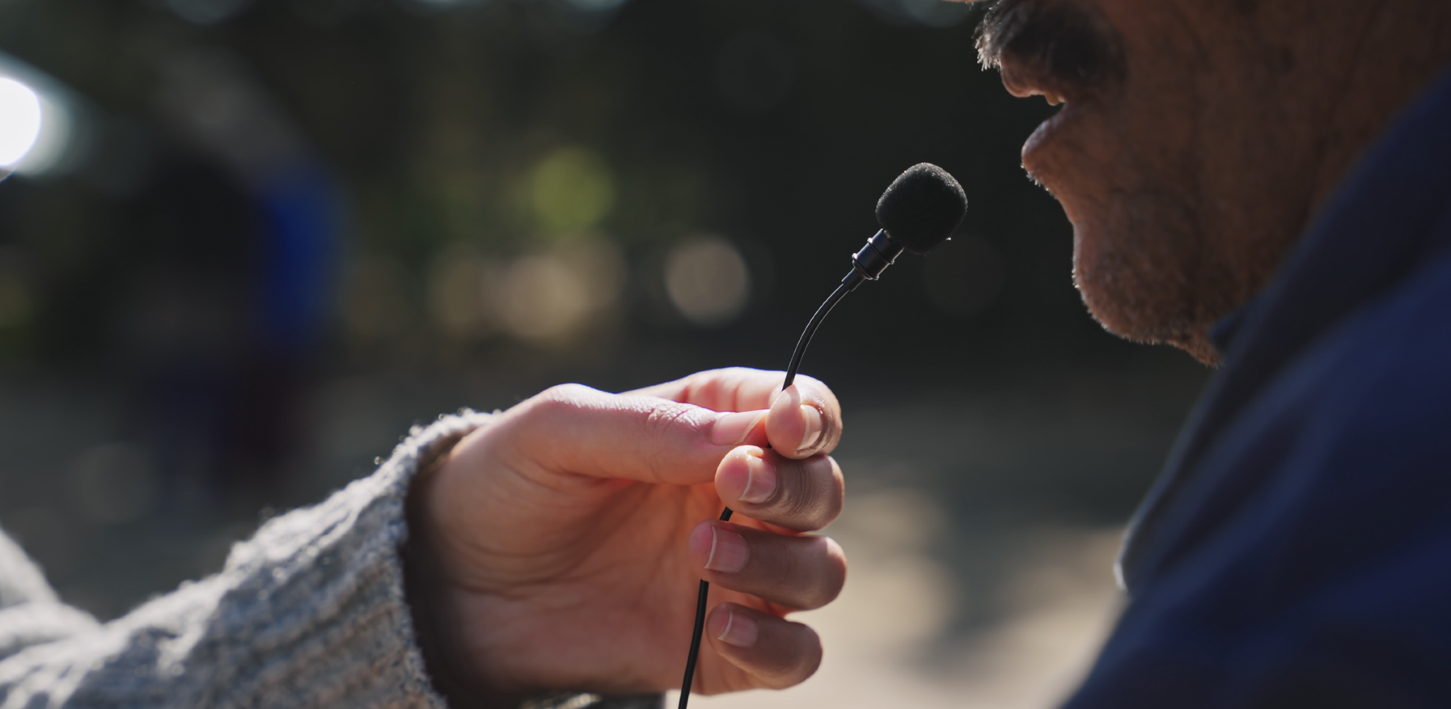 Microphone recording citizen testimony